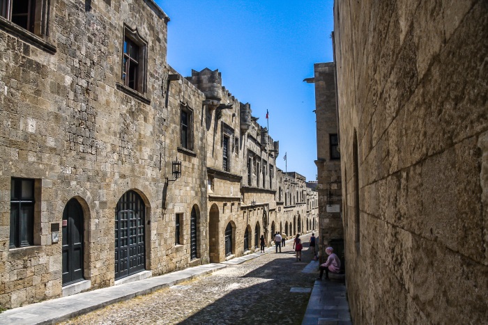 walking through old streets of Rhodes town greece